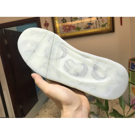 Air Jordan 4 x KAWS White 930155-100