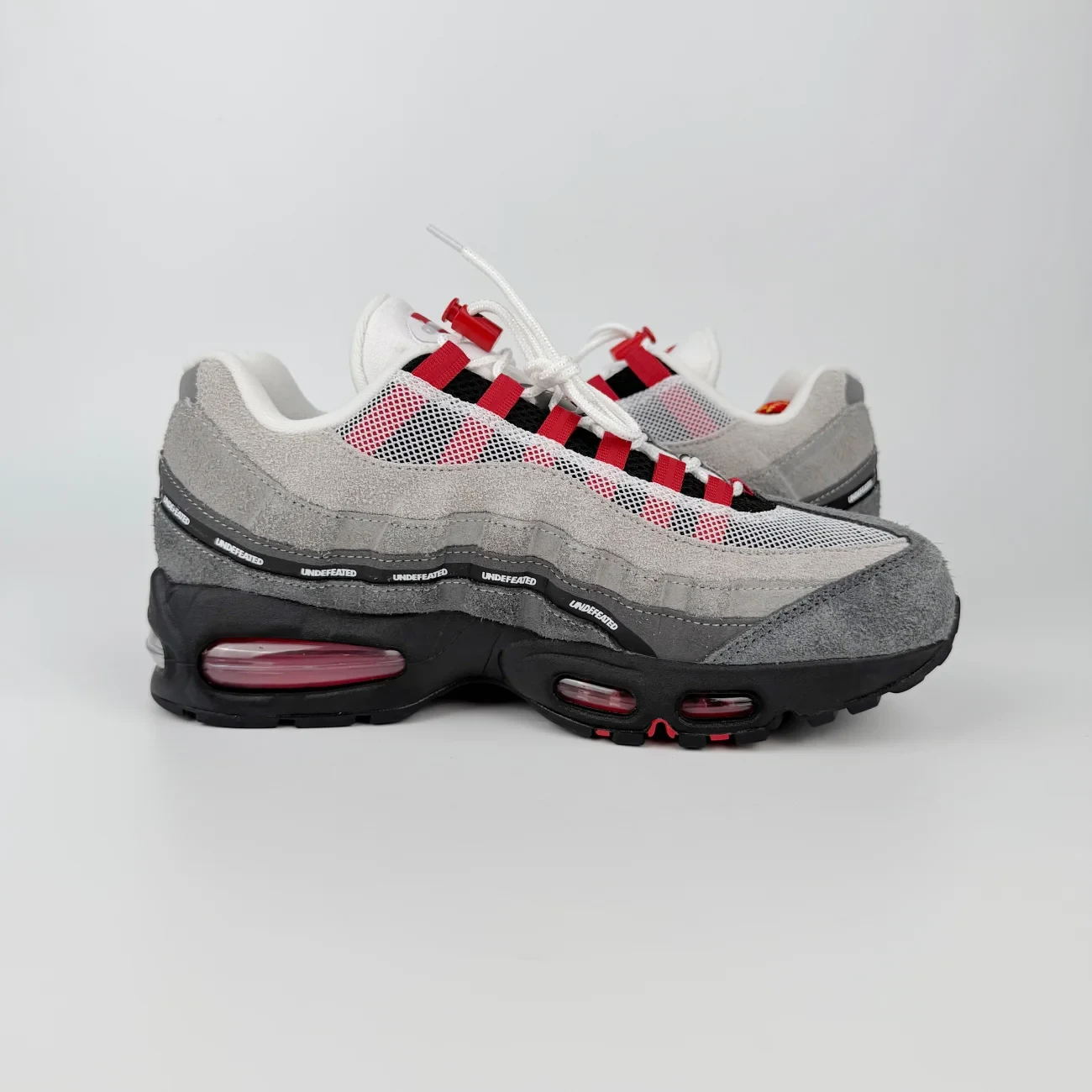 Undefeated X Nike Air Max 95 Bright Crimson Gx Batch Factory Ib4523 003 (9) - www.gxsole.com Undefeated X Nike Air Max 95 Bright Crimson Gx Batch Factory Ib4523 003 (9) - www.gxsole.com